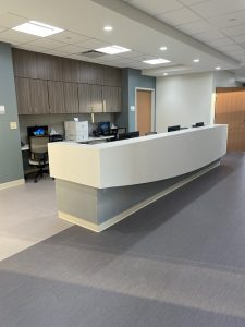 Nurses Station - Casework fully wrapped with Corian Solid Surface